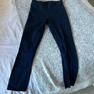 Lululemon Fast and Free high rise leggings with pockets. 23”, true navy color